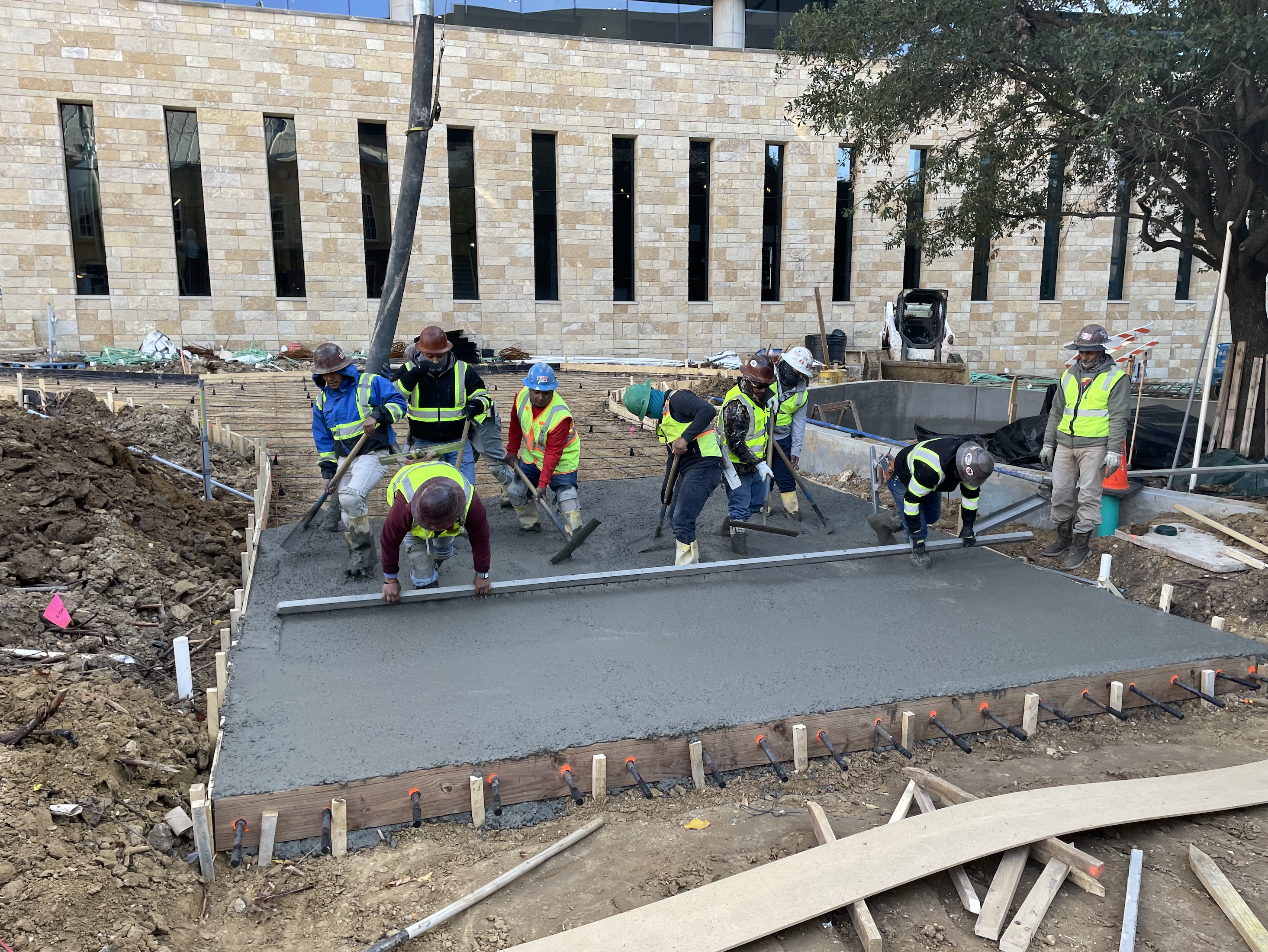 Trillium crew finishing a concrete pour